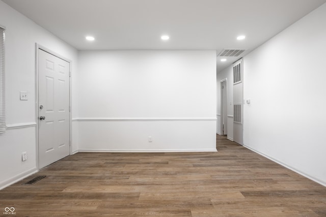 empty room featuring hardwood / wood-style floors