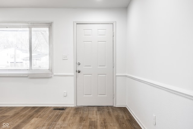 foyer featuring wood-type flooring