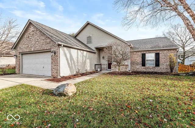 single story home with a garage and a front lawn