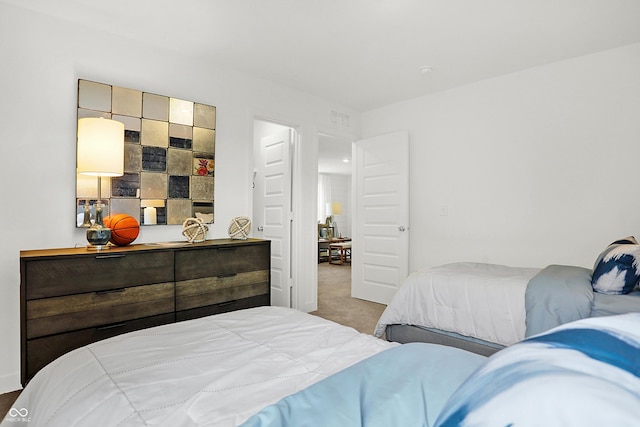 bedroom featuring carpet flooring