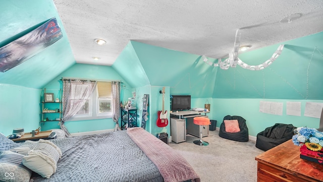 bedroom featuring vaulted ceiling, carpet, and a textured ceiling