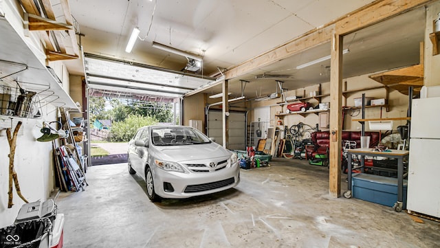 garage with white refrigerator