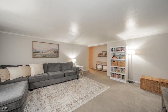 carpeted living room featuring crown molding