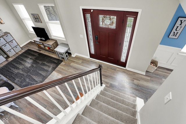 foyer entrance with hardwood / wood-style floors