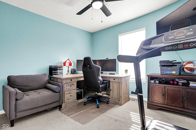 office space with light colored carpet and ceiling fan