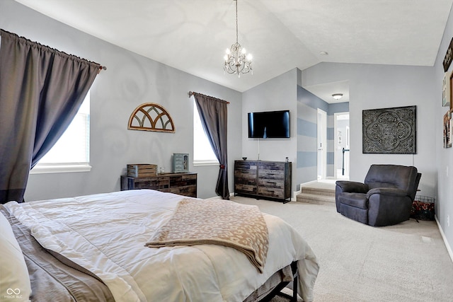 bedroom with multiple windows, vaulted ceiling, light carpet, and an inviting chandelier