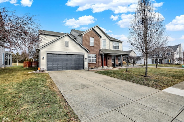 view of property featuring a garage and a front yard