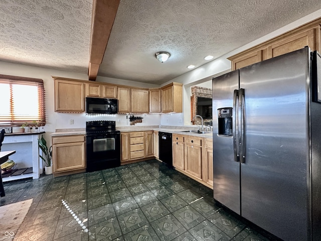 kitchen featuring beam ceiling, sink, a textured ceiling, and black appliances