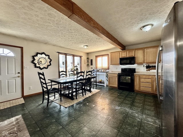 kitchen with beamed ceiling, a textured ceiling, and black appliances