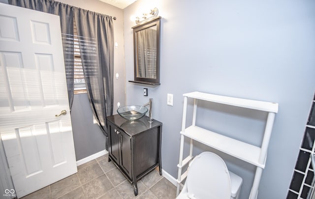 bathroom with sink and toilet