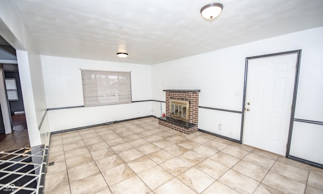 unfurnished living room with light tile patterned floors and a fireplace