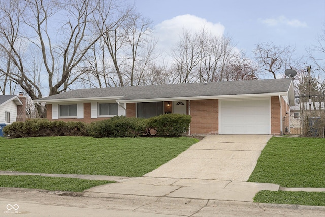 ranch-style house with a garage and a front lawn