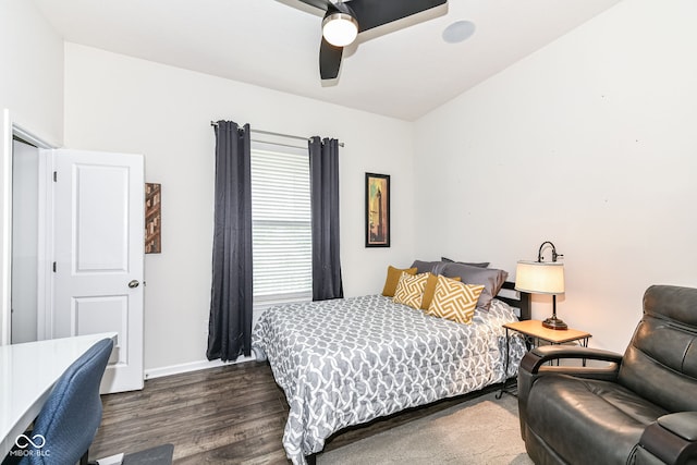 bedroom featuring dark wood-type flooring and ceiling fan