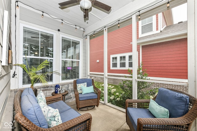 sunroom featuring ceiling fan and rail lighting