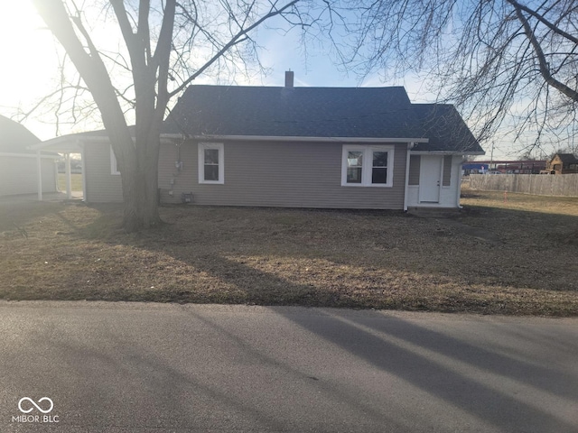 view of front of house with a carport