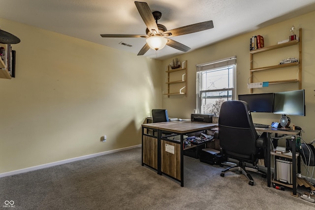 office area with carpet floors and ceiling fan