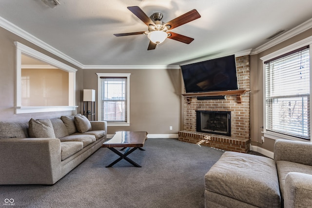 carpeted living room with a brick fireplace, crown molding, and ceiling fan