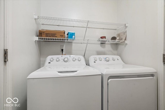 laundry area featuring washing machine and dryer