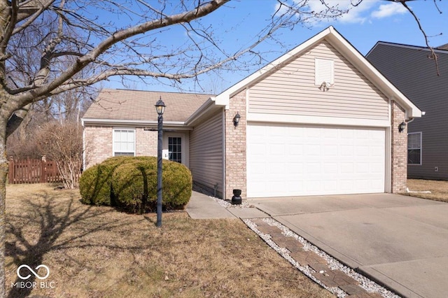 single story home featuring a garage