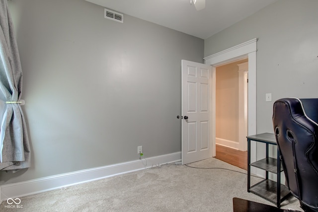 office area with light colored carpet