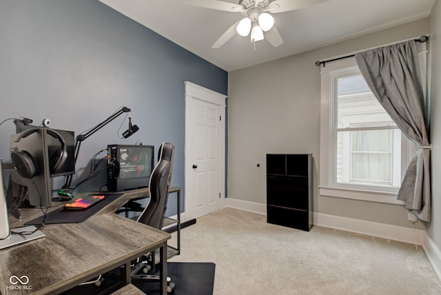 office area featuring ceiling fan and light colored carpet