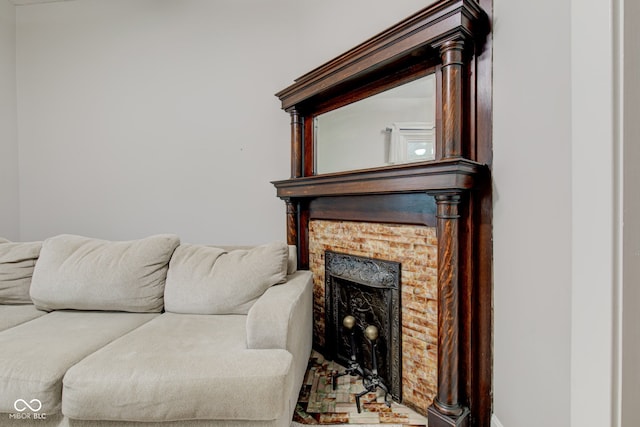 living room featuring a fireplace