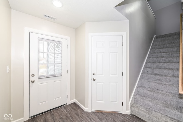 interior space with dark wood-type flooring