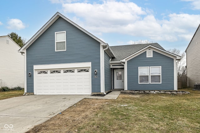 view of property featuring a garage, central AC, and a front yard