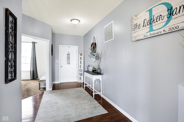 entryway featuring dark hardwood / wood-style floors