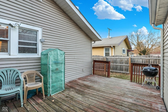 wooden deck with area for grilling