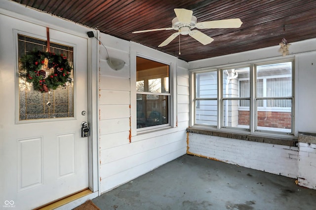 interior space featuring ceiling fan