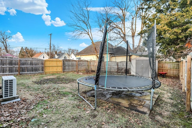 view of yard featuring a trampoline