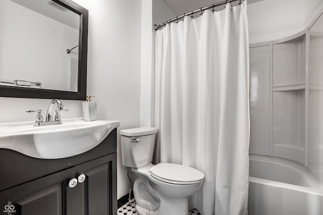 full bathroom featuring vanity, toilet, and shower / bath combo with shower curtain