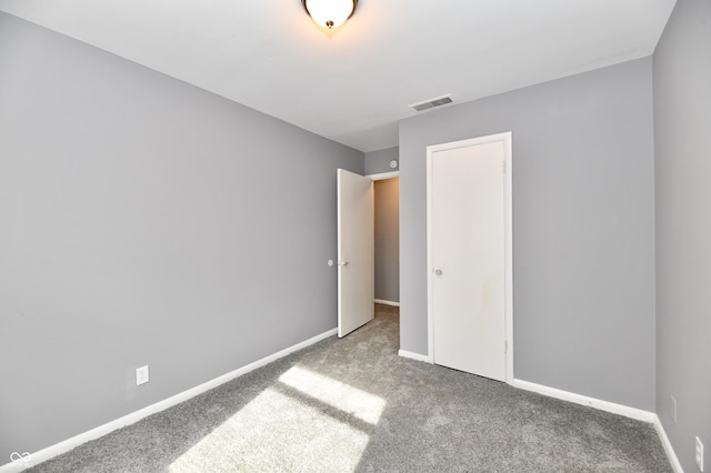 unfurnished bedroom featuring carpet