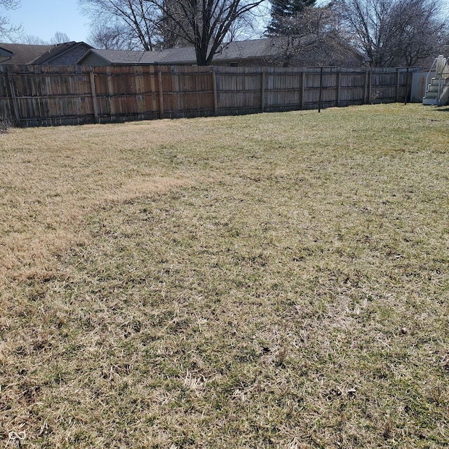 view of yard with fence