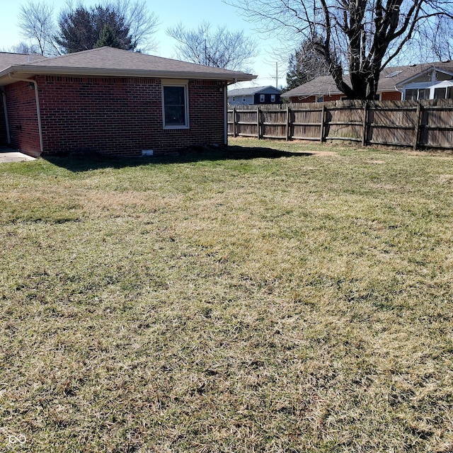 view of yard with fence