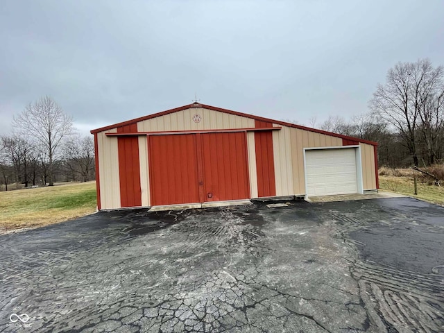 view of outbuilding with a garage