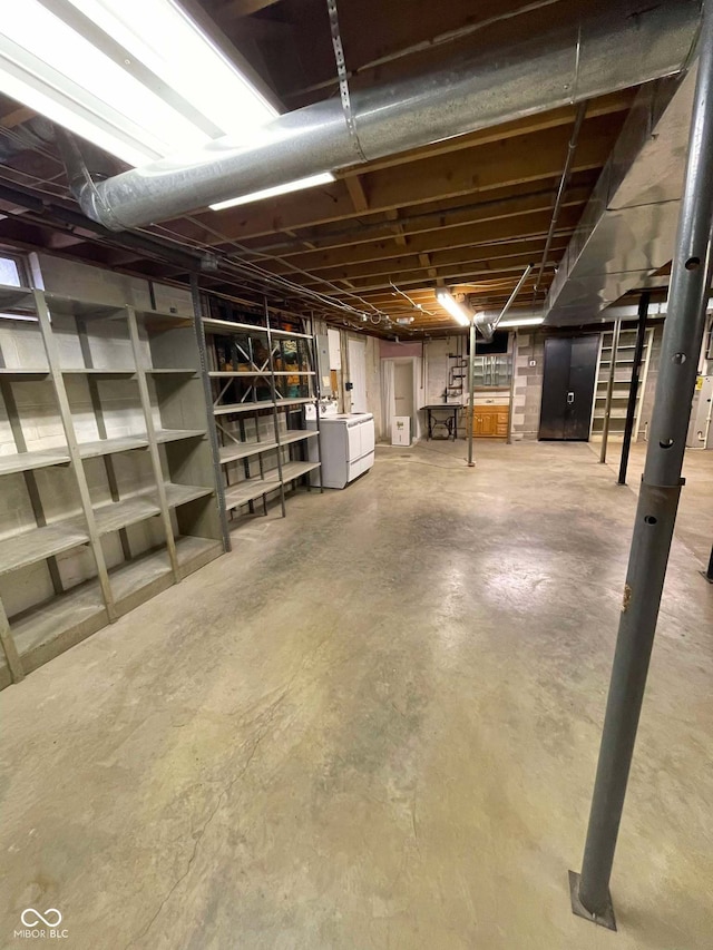 basement featuring separate washer and dryer