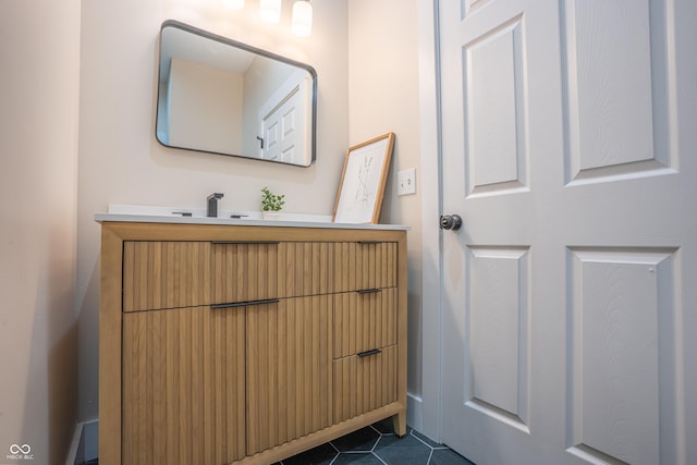 bathroom featuring tile patterned floors and vanity