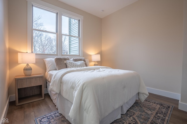 bedroom featuring dark wood-type flooring