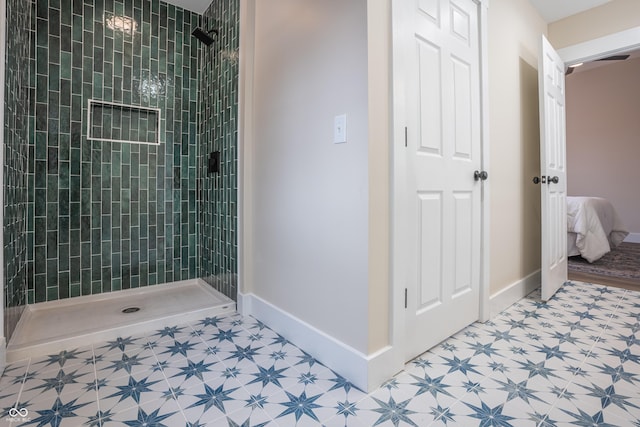 bathroom featuring tiled shower