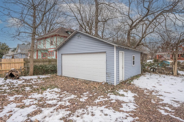 view of snow covered garage