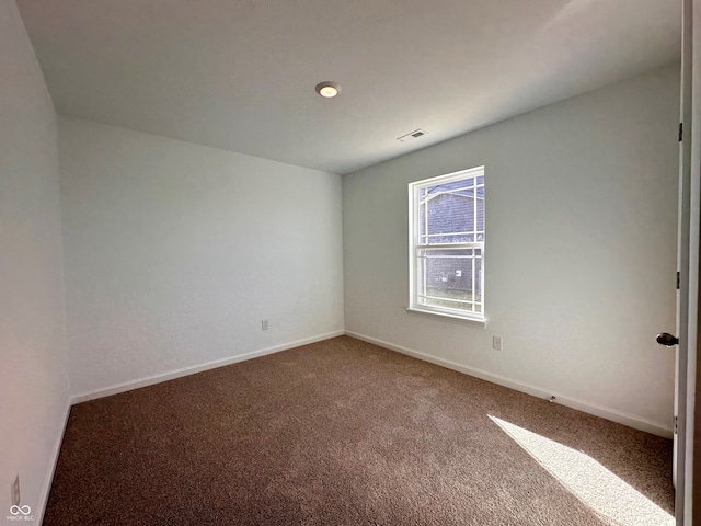 view of carpeted spare room