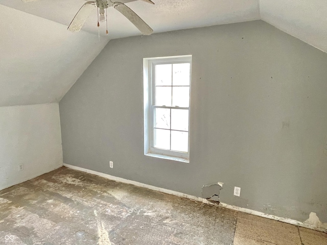 additional living space featuring vaulted ceiling and ceiling fan