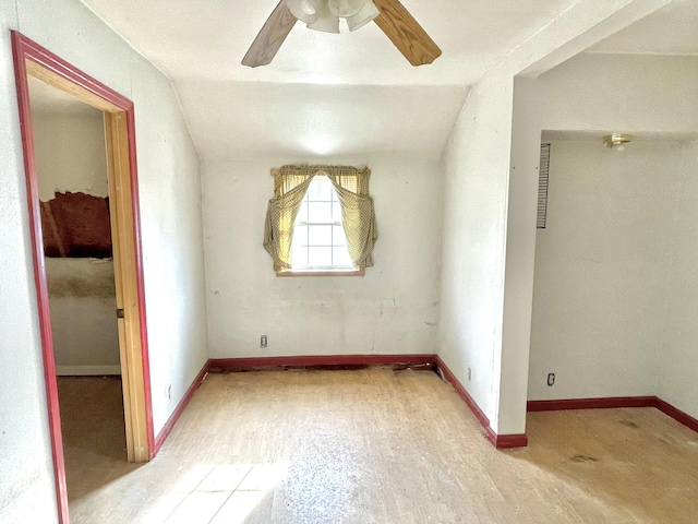 additional living space featuring vaulted ceiling, ceiling fan, and light hardwood / wood-style flooring