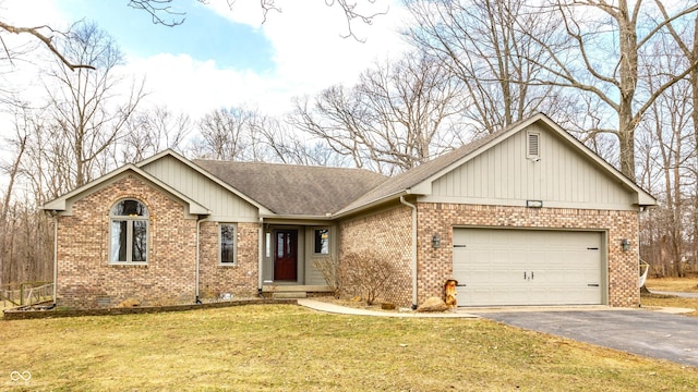 ranch-style house featuring aphalt driveway, a garage, brick siding, and crawl space