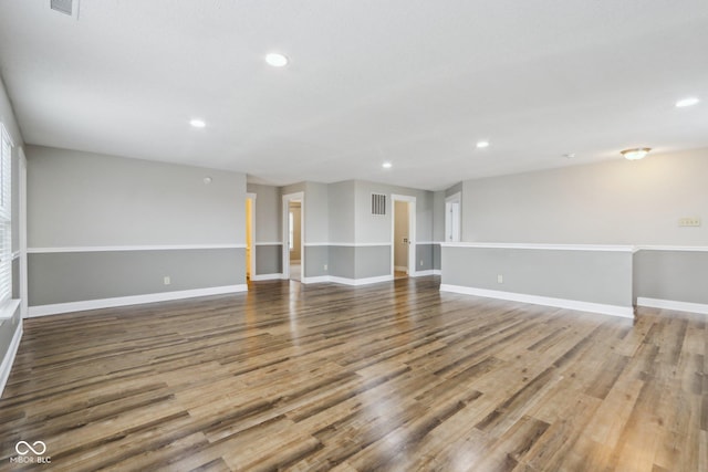 spare room featuring hardwood / wood-style floors