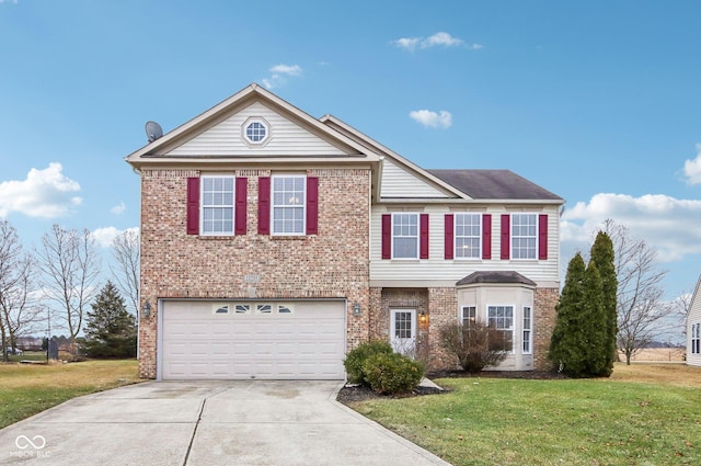 view of property featuring a garage and a front yard