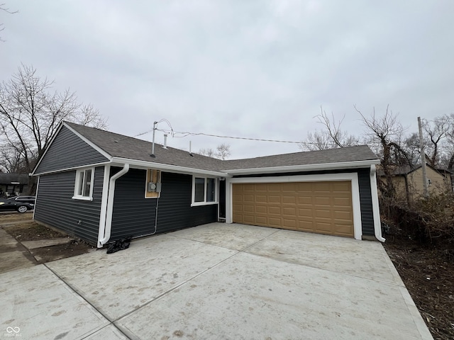 ranch-style house with a garage