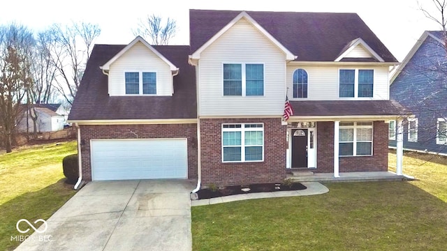 traditional-style home featuring concrete driveway, brick siding, a front lawn, and an attached garage